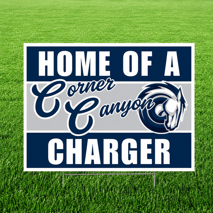 Home of a Corner Canyon Charger yard sign featuring bold navy, silver, and white school colors, large white "HOME OF A" and "CHARGER" text, a script-style "Corner Canyon" across the center, and the Corner Canyon Chargers horse head logo on a corrugated plastic yard sign with an H-stake for outdoor display.