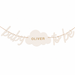 Personalized baby shower banner reading 'baby to be' with a central cloud shape reading 'OLIVER' in gold lettering, on a white background.