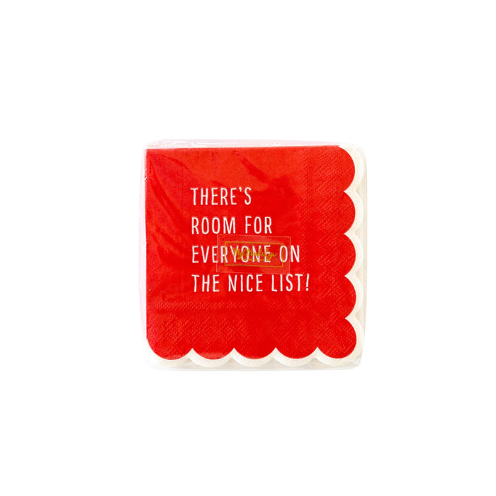 A single red paper napkin with scalloped edges and white text that reads, 'THERE'S ROOM FOR EVERYONE ON THE NICE LIST!' on a plain white background.