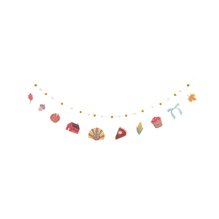 Decorative string with small colorful Autumn items on a white background
