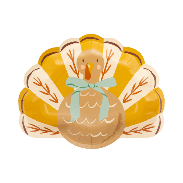 Turkey-shaped paper plates with a bow on a white background