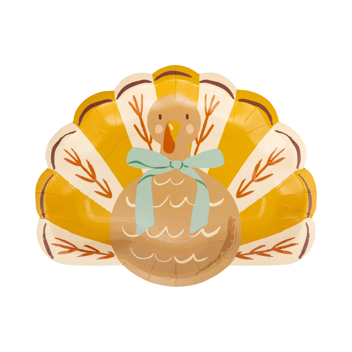 Turkey-shaped paper plates with a bow on a white background