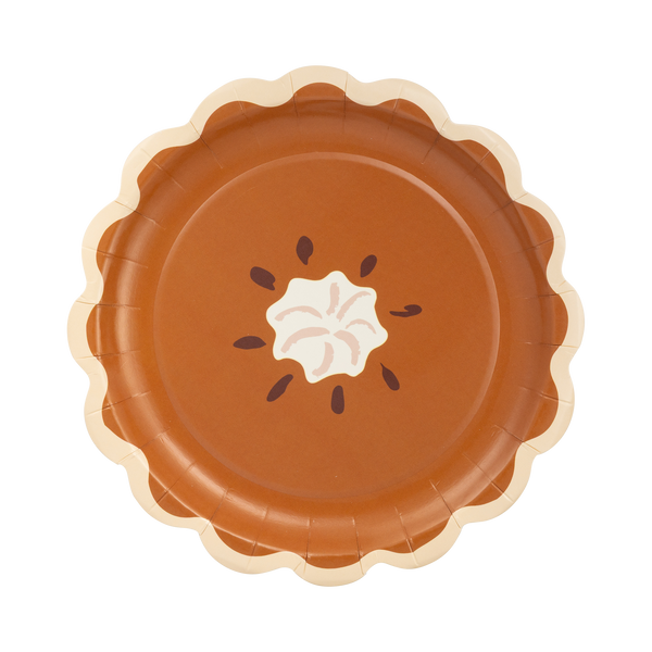 Paper plate designed to look like a pumpkin pie with whipped cream on a white background