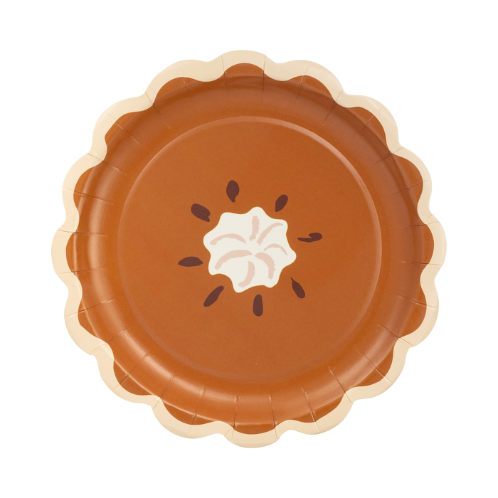 Paper plate designed to look like a pumpkin pie with whipped cream on a white background