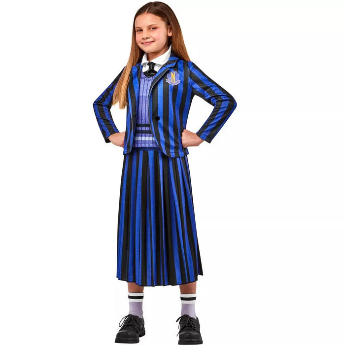 Girl wearing a blue and black striped blazer and matching pleated skirt with white collar, black tie, lavender socks, and black shoes in a school uniform style costume.
