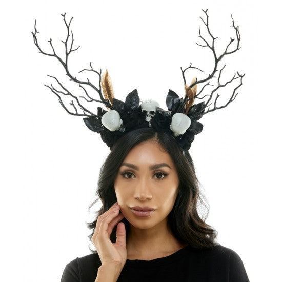 A women wearing a Goth Skull Headband.