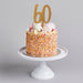 Product photo of Gold Number '60' Glitter Acrylic Cake Topper — a Hootyballoo party product shown on a plain background.