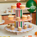 Product photo of Playful Brights 3 Tier Cake Stand — a Hootyballoo party product shown on a plain background.