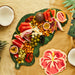 Product photo of Tropical Leaf Grazing Board — a Hootyballoo party product shown on a plain background.