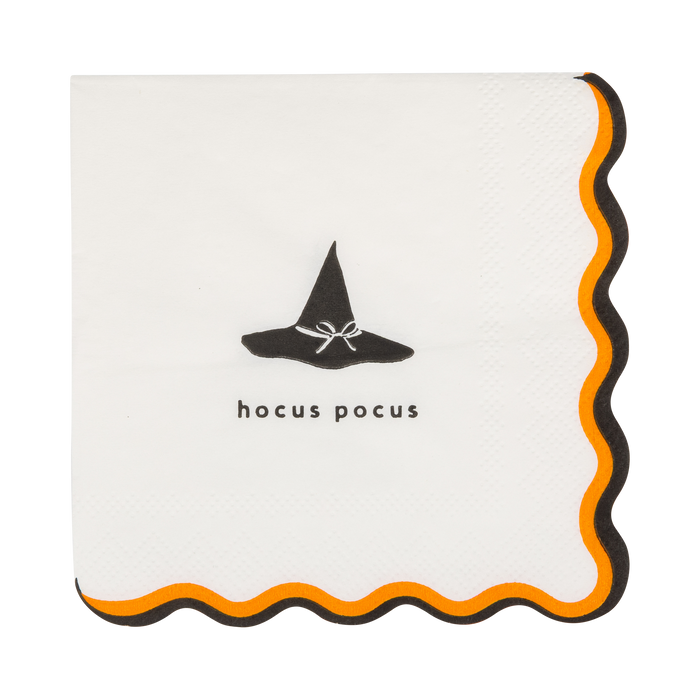 Halloween-themed napkin with a witch hat design and 'hocus pocus' text on a white background