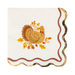 Decorative paper napkin with a turkey design and autumn leaves on a white background