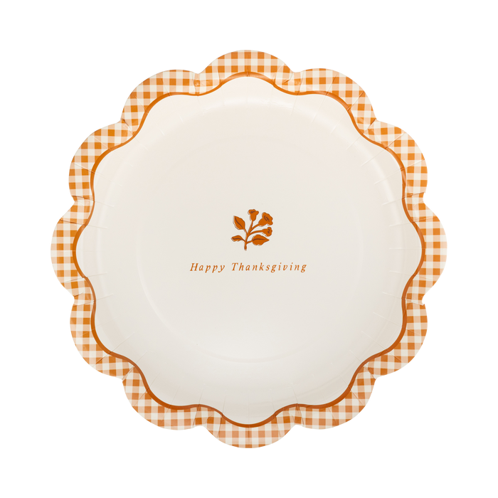 Decorative plate with a checkered border and 'Happy Thanksgiving' text on a white background