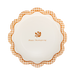 Decorative plate with a checkered border and 'Happy Thanksgiving' text on a white background