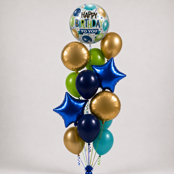 A balloon bouquet featuring a round foil balloon at the top with 'HAPPY BIRTHDAY TO YOU' text, surrounded by metallic gold, navy blue, light green, and teal latex balloons, including two blue star-shaped balloons, set against a plain light gray background.