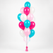 Hello Kitty themed accent balloon bouquet with hot pink, light pink, teal, and white balloons, curling ribbon, and balloon weight.