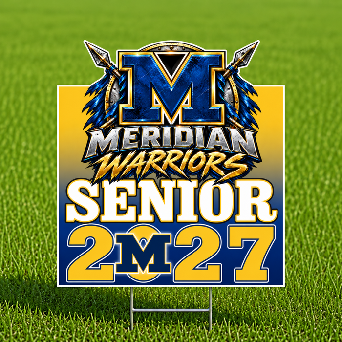 A rectangular yard sign on a metal stake displayed on a green grass field. The sign features a blue and gold gradient background with a large metallic blue 'M' logo flanked by crossed arrows, the words 'MERIDIAN WARRIORS', 'SENIOR', and '2027' in bold white and gold lettering.