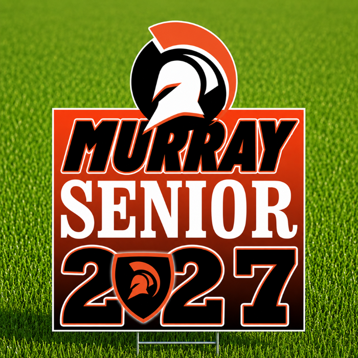 A rectangular yard sign on a metal stake displayed on a green grass field. The sign features a Spartan helmet logo at the top, with the text 'MURRAY SENIOR 2027' in black and white with orange outlines.