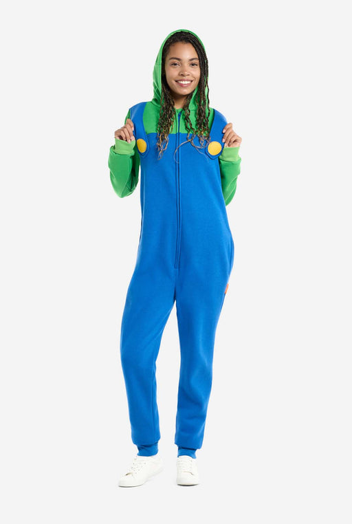 A woman wearing an Adult Mario Bros. Luigi Onsie Costume.