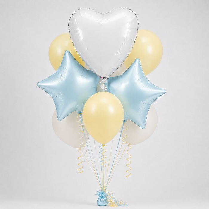 A balloon bouquet featuring a white heart balloon, two light blue star balloons, a few pale yellow latex balloons, and a few off-white balloons, tied together with spiral ribbons and a small blue balloon weight on a light gray background.