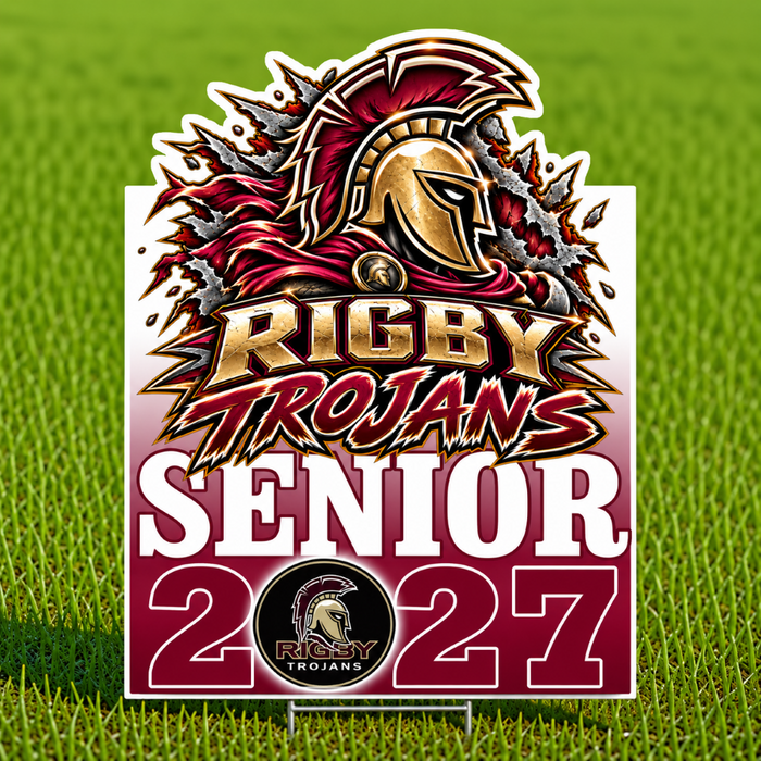 A custom 'Rigby Trojans Senior 2027' yard sign featuring a Spartan helmet and Spartan-themed graphic, displayed on a green grass background.