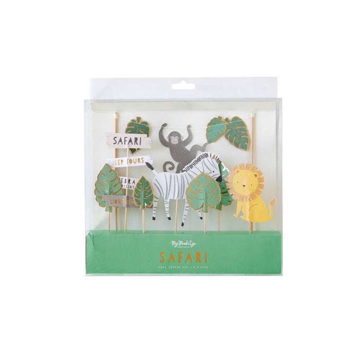 Safari cake topper set with animal picks, green leaves, safari signs, a monkey, zebra, and lion in clear packaging.