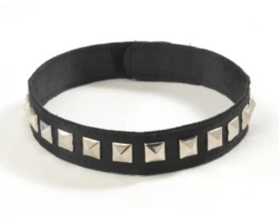 A black fabric choker necklace decorated with a row of silver pyramid studs, shown against a plain white background.