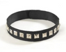 A black fabric choker necklace decorated with a row of silver pyramid studs, shown against a plain white background.