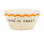 Round white bowl with orange rim and Halloween-themed design with "Trick or Treat" words, on a white background