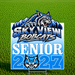 A rectangular yard sign displayed on a green grass field. The sign features a blue and white 'Sky View Bobcats' logo with a bobcat graphic, the word 'SENIOR', and '2027'.