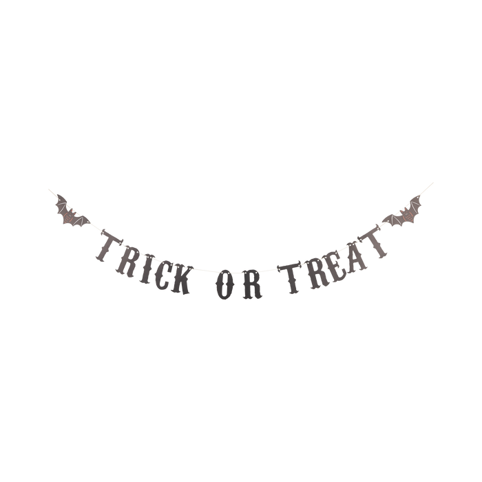 Black "Trick or Treat" banner with bat cutout details 
