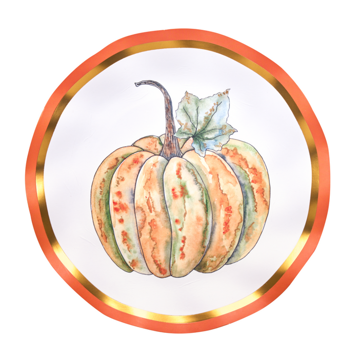 A round white plate featuring a watercolor-style illustration of a striped orange and green pumpkin with a leafy stem, framed by a metallic gold inner ring and a wide orange outer rim, on a white background.