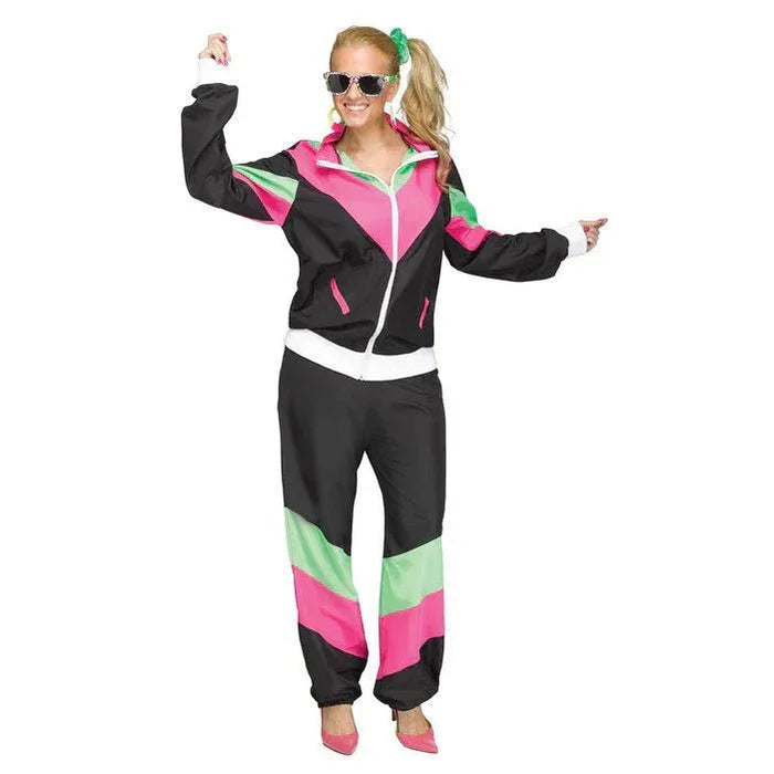 Neon 80s track suit costume in black with hot pink and lime green color-blocking on the jacket and pants, paired with sunglasses and a green hair clip.