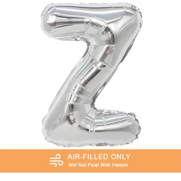 Silver metallic mylar balloon shaped like the letter Z with an orange banner below stating "Air-Filled Only Will Not Float With Helium.