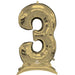 Gold foil number 3 balloon with a curved self-standing base, featuring a shiny metallic finish and an inflation valve at the bottom.