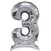 Silver metallic number 3 balloon with a shiny finish and clear base stand for self-supporting display.
