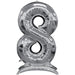 Silver metallic number 8 foil balloon with self-standing base stand, approximately 54 inches tall.
