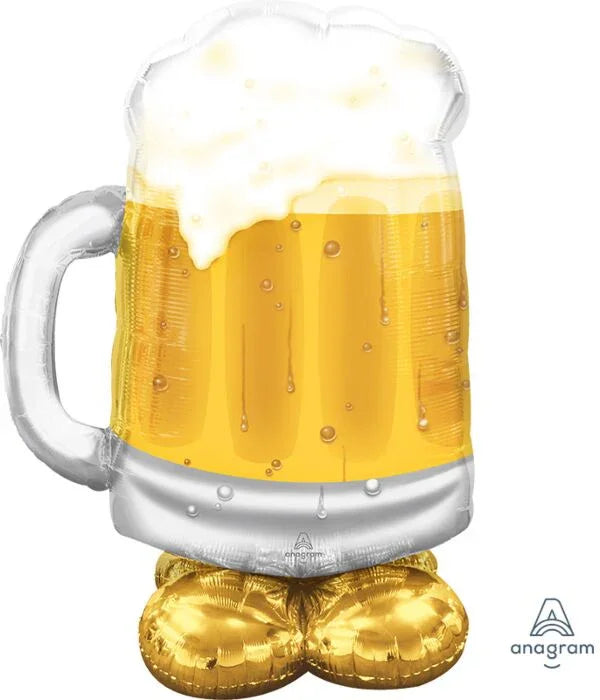Oversized foil balloon shaped like a full beer mug with golden beer, white foam head, and gold balloon weights attached to the bottom.