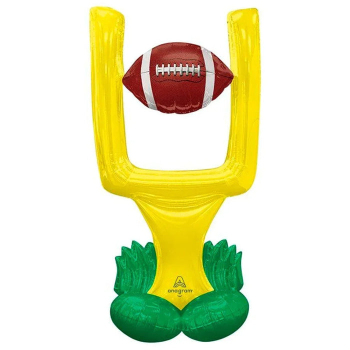 Yellow foil balloon shaped like a goalpost with a red and white football positioned at the top and green inflatable gloves at the base.
