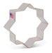Gray metal eight-pointed star cookie cutter with an American flag label on the left side.