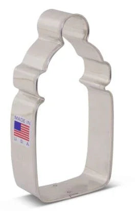 Gray metal baby bottle-shaped cookie cutter with a "Made in USA" flag label on the handle.