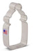 Gray metal baby bottle-shaped cookie cutter with a "Made in USA" flag label on the handle.