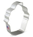 Silver metal cupcake-shaped cookie cutter with scalloped edges and a small American flag label on the handle.