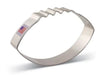 Silver metal football-shaped cookie cutter with wavy crimped edges and a small American flag label on the band.