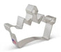 Metal princess crown-shaped cookie cutter with silver finish and small American flag label on the handle.