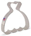 Gray metal cookie cutter shaped like a wedding dress with a heart neckline and small American flag label on the left side.
