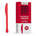 Red plastic knife displayed next to its packaging box labeled Heavy Duty Plastic Knives with a count of 20 pieces.