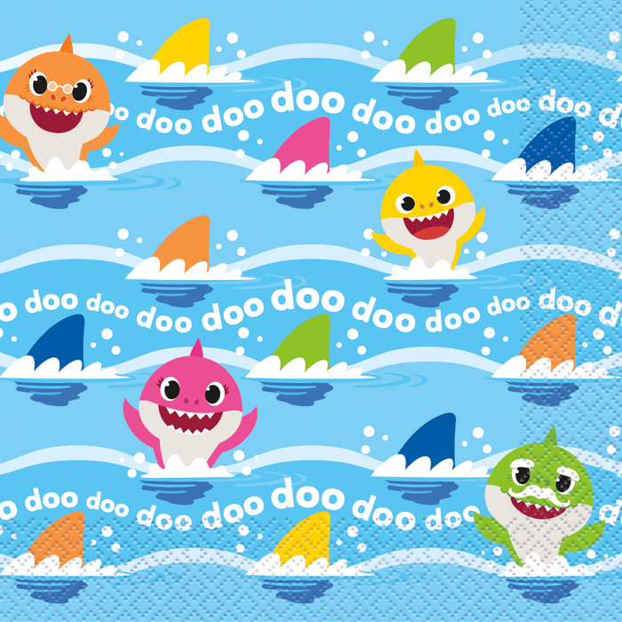 Blue napkin design featuring colorful smiling baby sharks in orange, yellow, pink, and green with "doo doo" text repeated across a wavy ocean background.