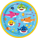 Blue paper plate with yellow rim featuring colorful cartoon sharks and fish characters including pink, green, yellow, orange and blue smiling sharks surrounded by smaller fish and jellyfish.