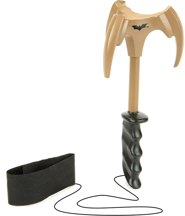 Tan and black Batman-themed grappling hook with bat logo, featuring a wooden handle, black grip, and attached black fabric wrist strap coiled below.