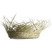 Woven straw basket with a wide, shallow bowl shape and jagged, straw-like edges extending upward around the rim in natural tan and cream tones.
